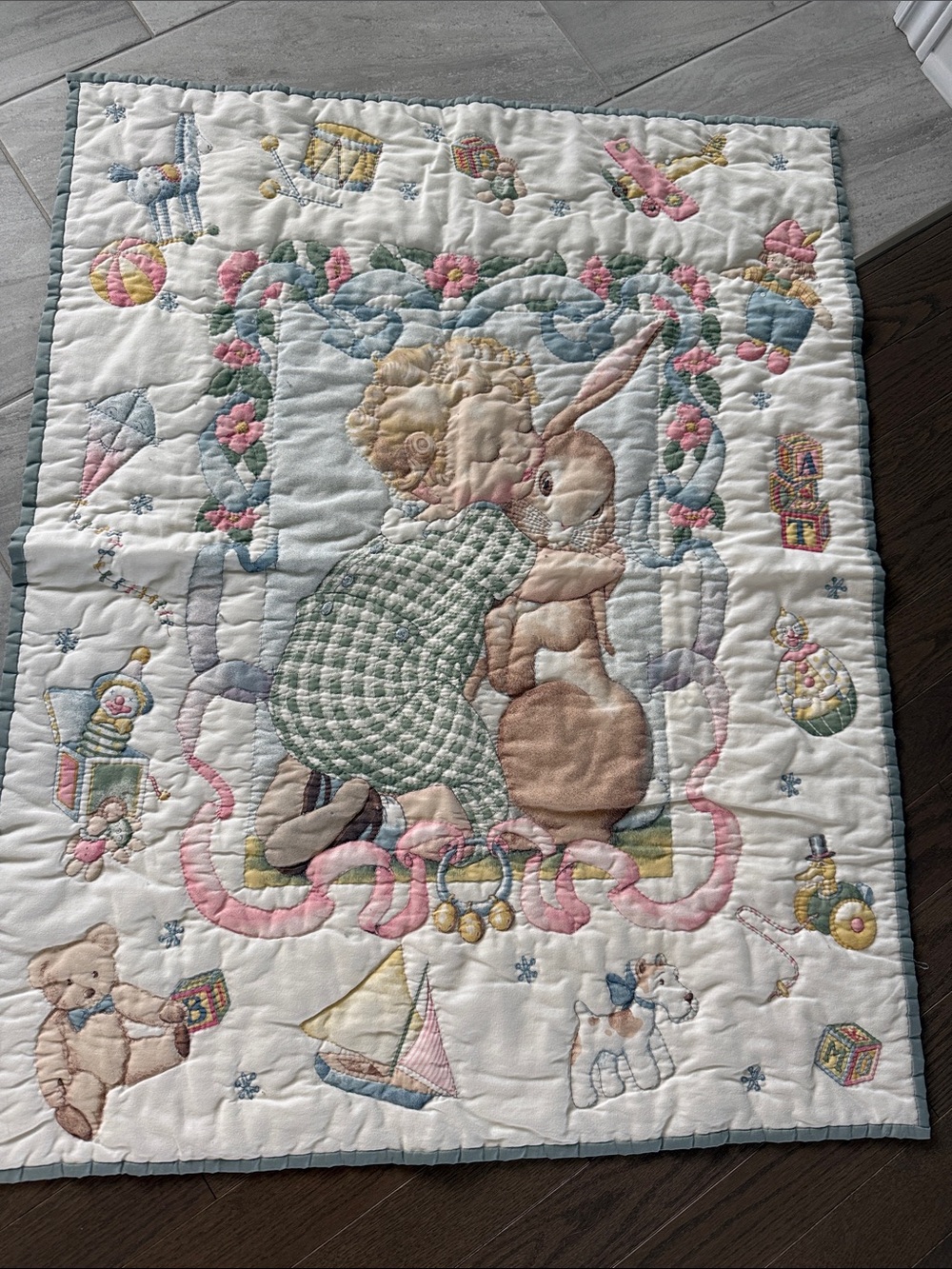 Vintage-Inspired Cream Baby Quilt with Pastel Accents